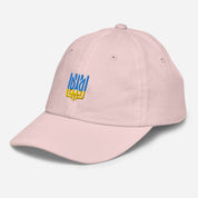 Youth pink baseball cap with Ukrainian Tryzub emblem, breathable and adjustable, ideal for active kids. Made of 100% bio-washed cotton twill.