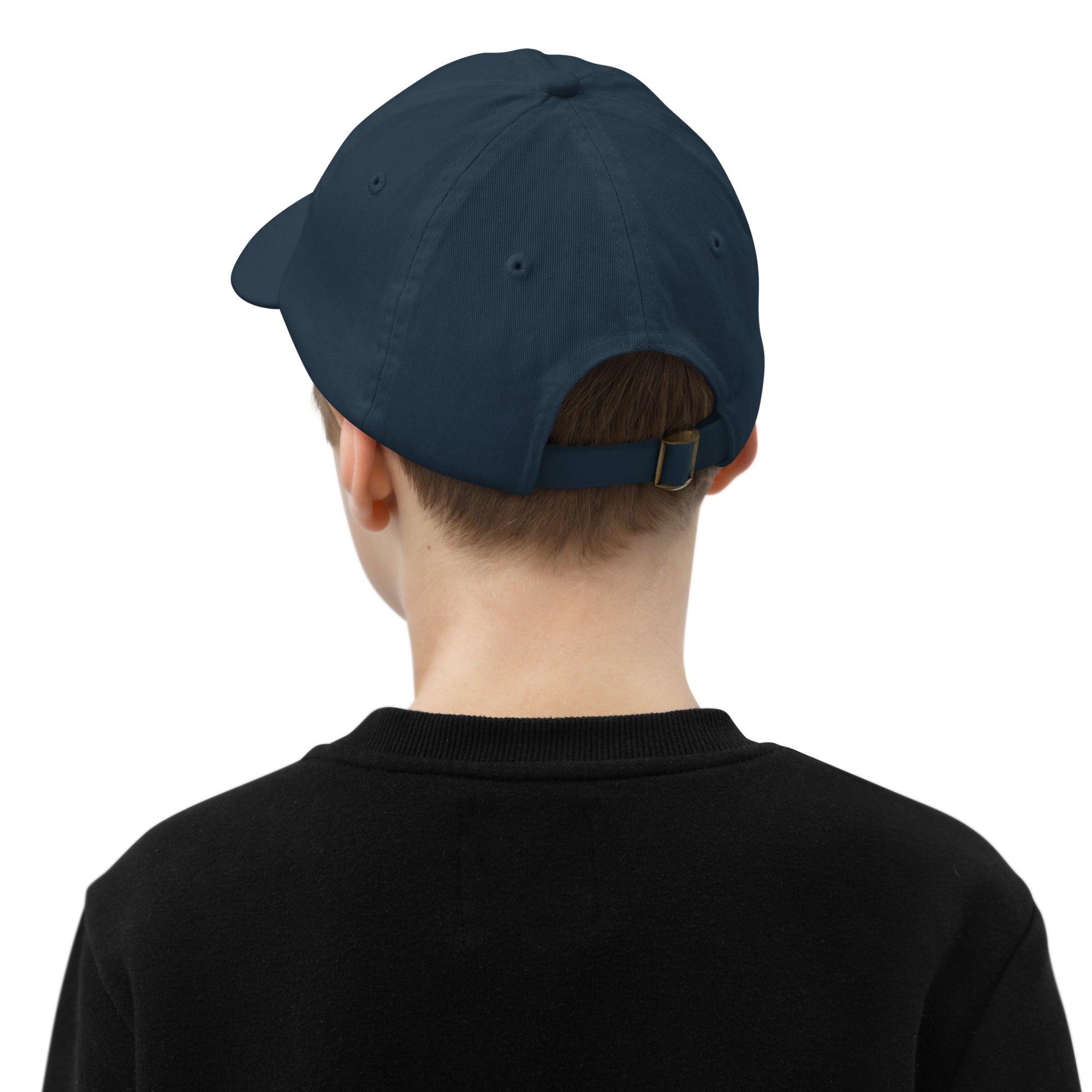 Back view of a youth wearing an adjustable baseball cap with Ukrainian Tryzub, made from bio-washed chino cotton twill.