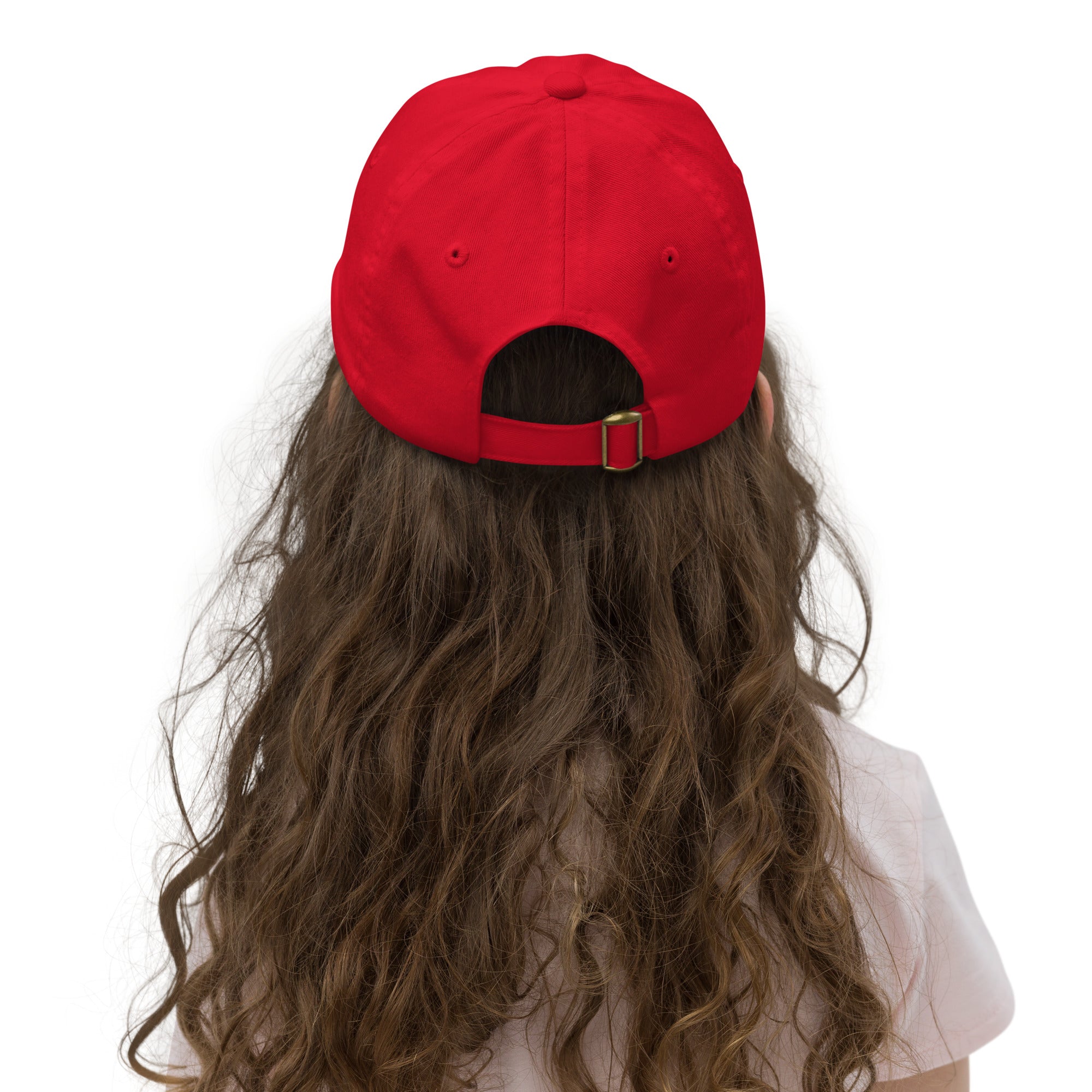 Rear view of a child wearing a red youth baseball cap with adjustable strap, ideal for sports and featuring breathable chino cotton twill.