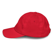 Youth baseball cap with Ukrainian Tryzub, red, breathable, adjustable for active kids, made from 100% bio-washed chino cotton twill.