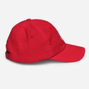 Red youth baseball cap with Ukrainian Tryzub emblem, adjustable strap, and breathable design for kids.