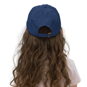 Child wearing a navy youth baseball cap with adjustable strap, showing back view. Ideal for active kids, featuring Ukrainian Tryzub and breathable design.