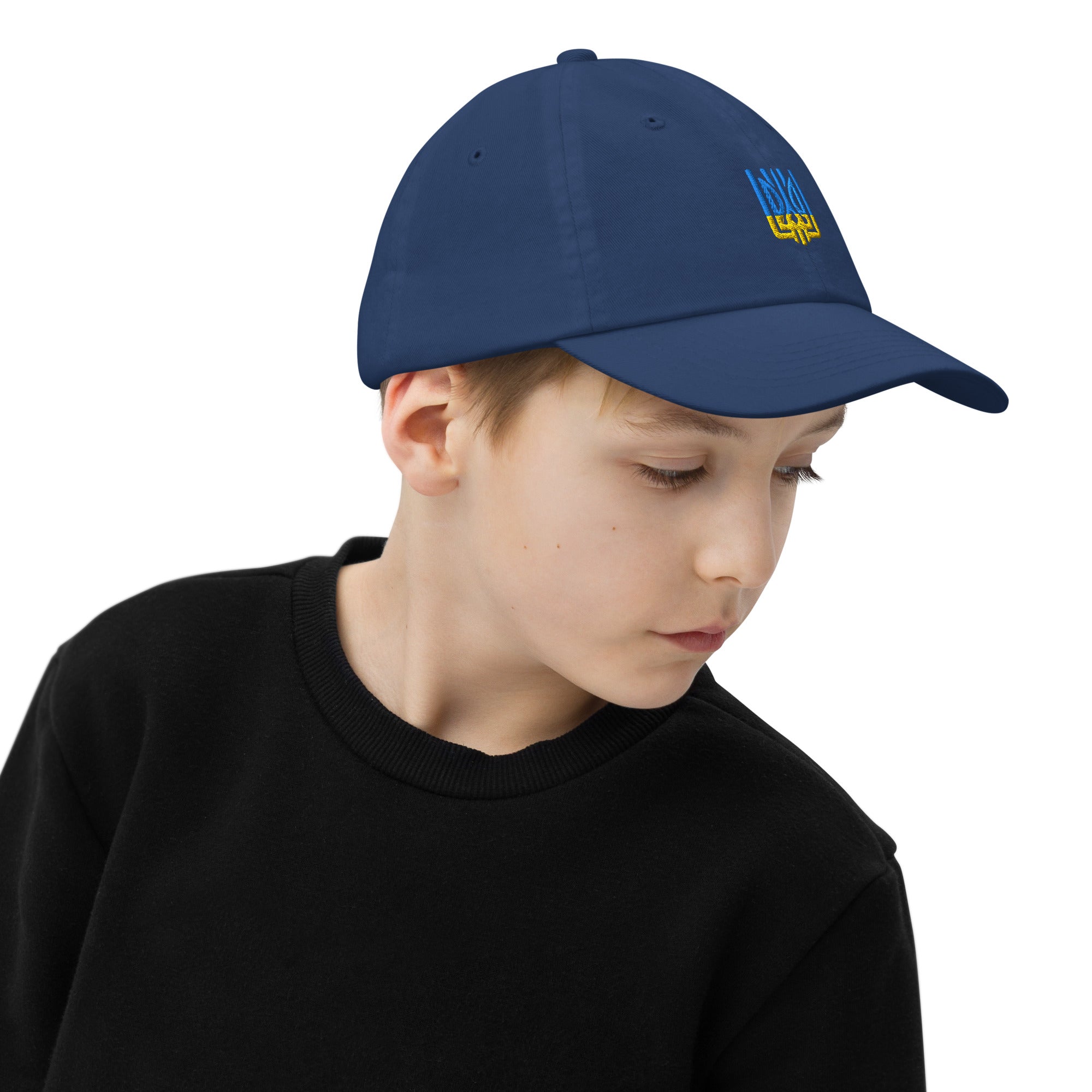Child wearing youth baseball cap with Ukrainian Tryzub, breathable and adjustable, ideal for outdoor activities and sports practice, navy blue.