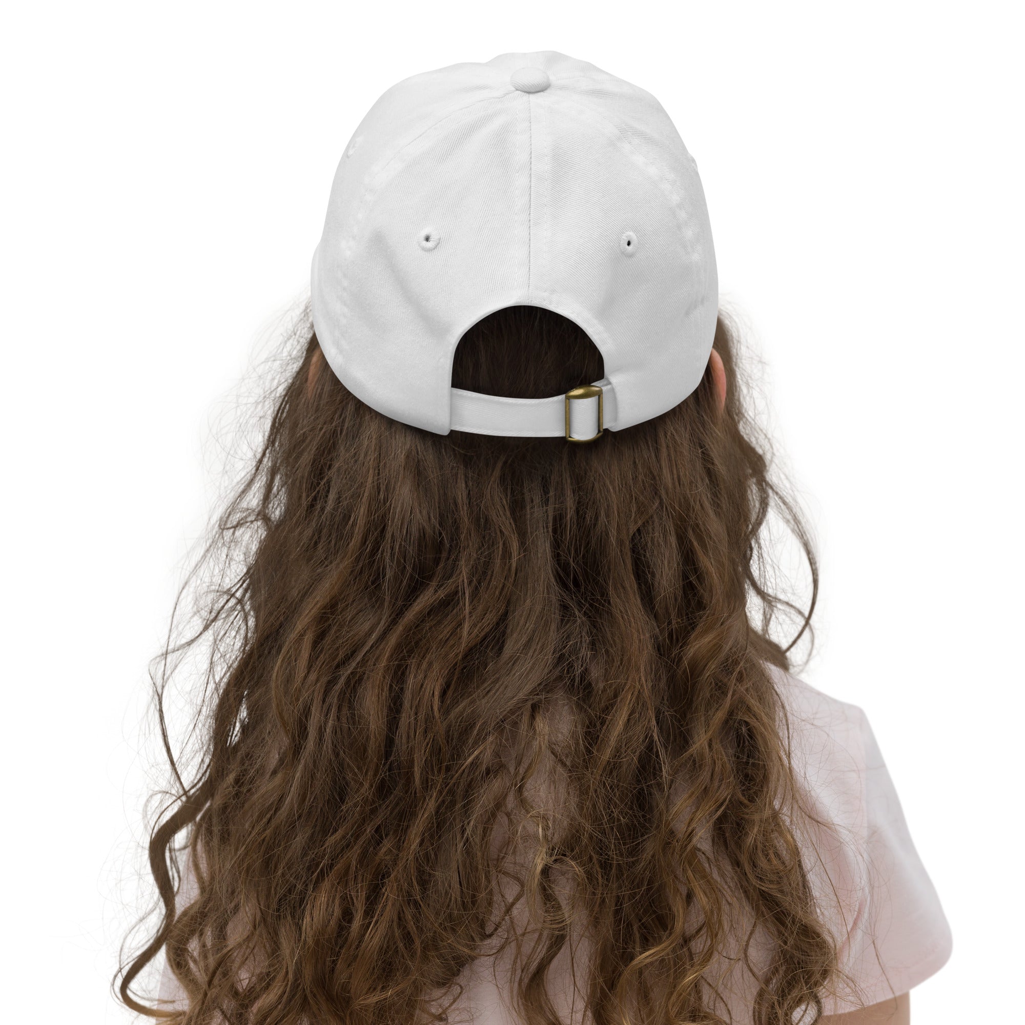 Back view of youth baseball cap with adjustable strap, worn by child, ideal for active kids. Made from breathable, bio-washed cotton twill.