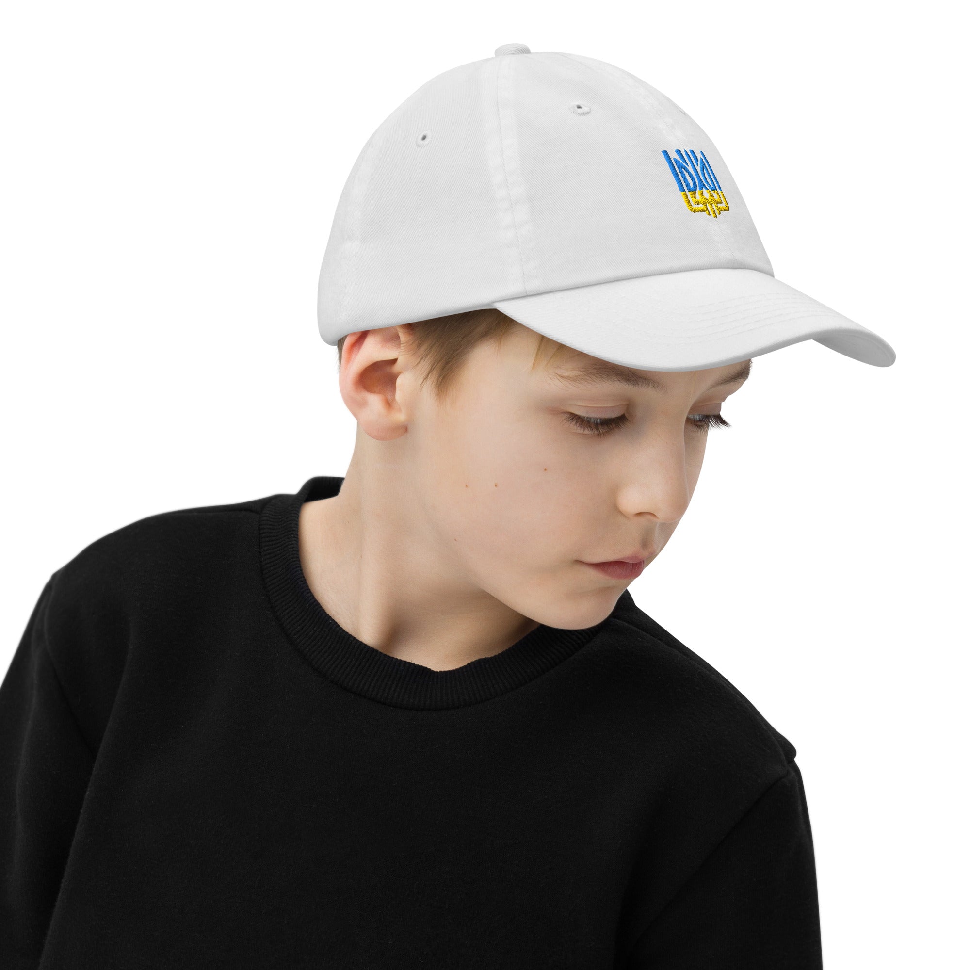 Youth baseball cap with Ukrainian Tryzub emblem, worn by child; breathable, adjustable fit for sports and outdoor activities.