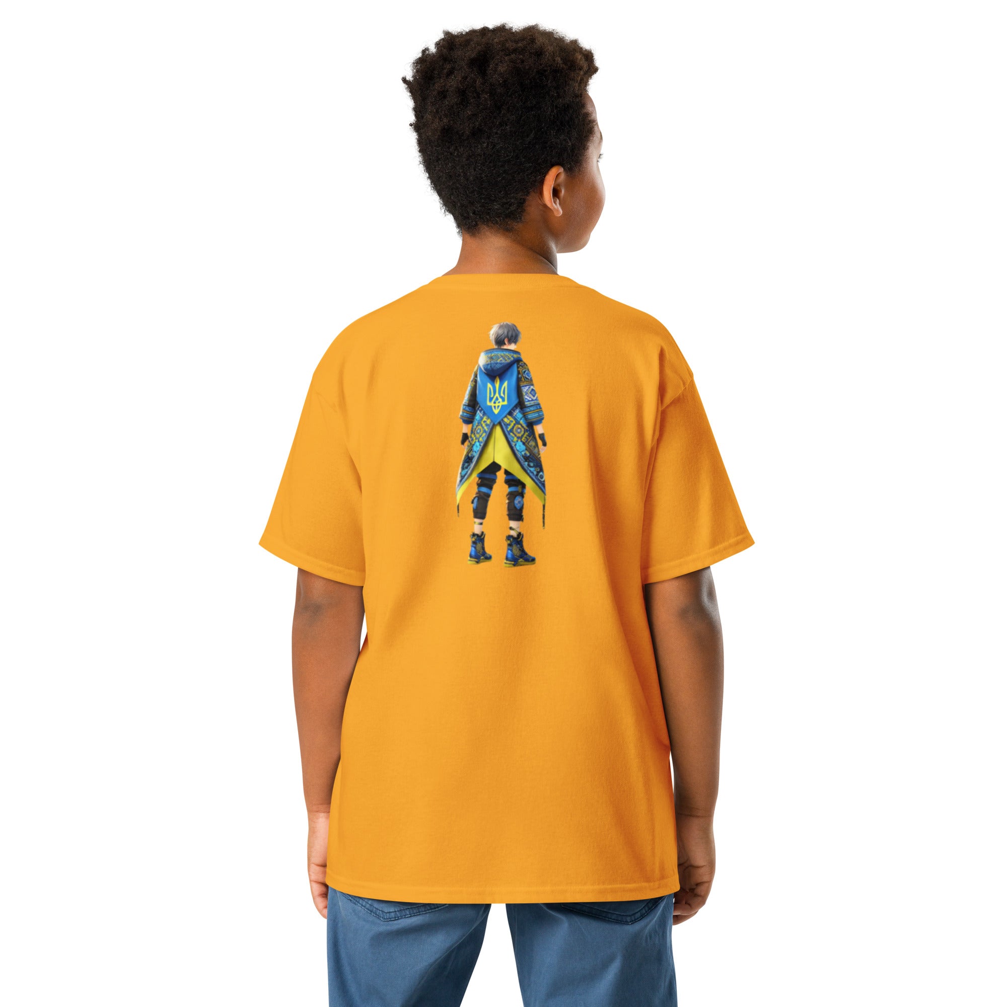 Youth wearing orange tee with Ukrainian anime character on back, showcasing style and cultural pride.