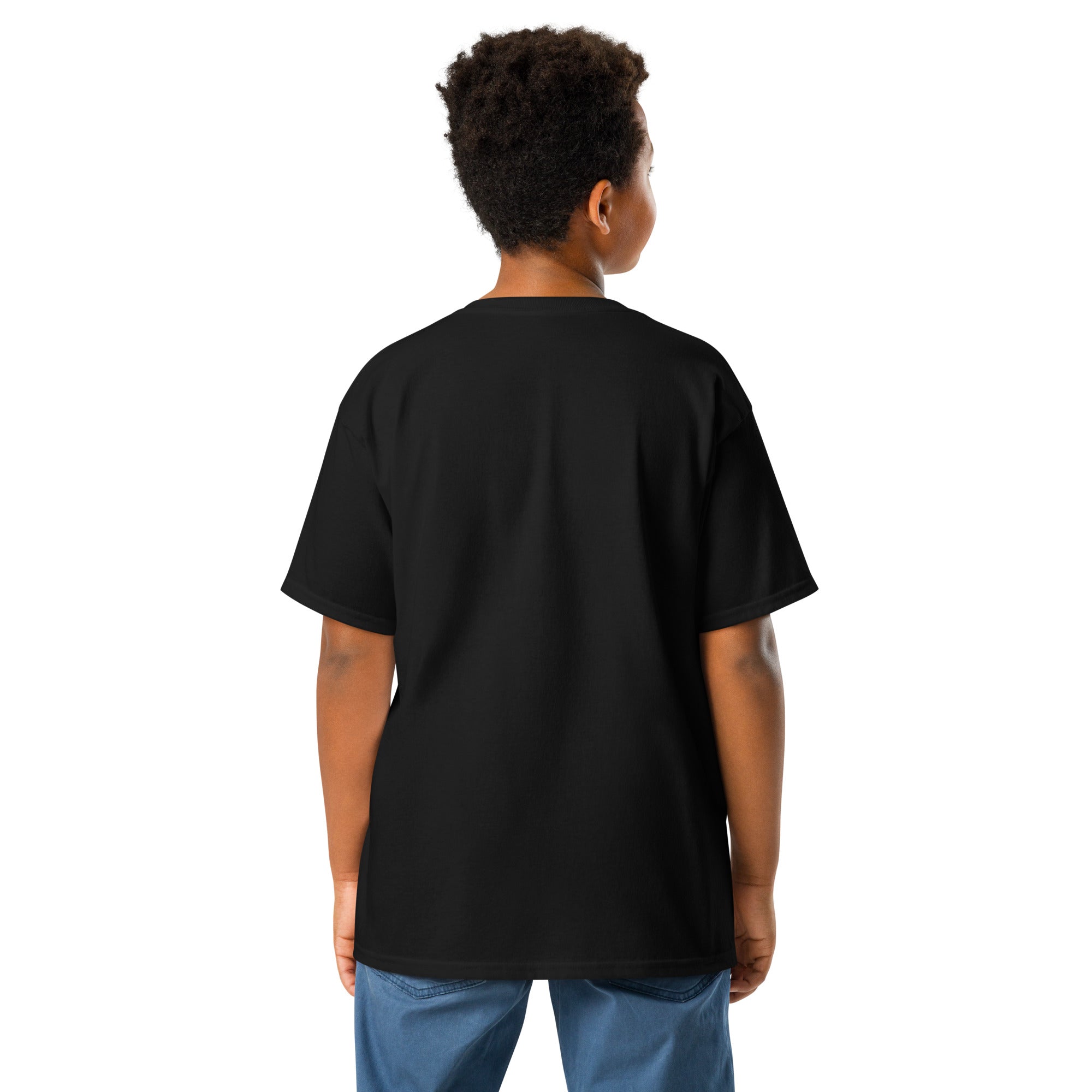 Youth wearing black classic t-shirt with Ukrainian emblem back view, highlighting Tryzub design, made from premium cotton.