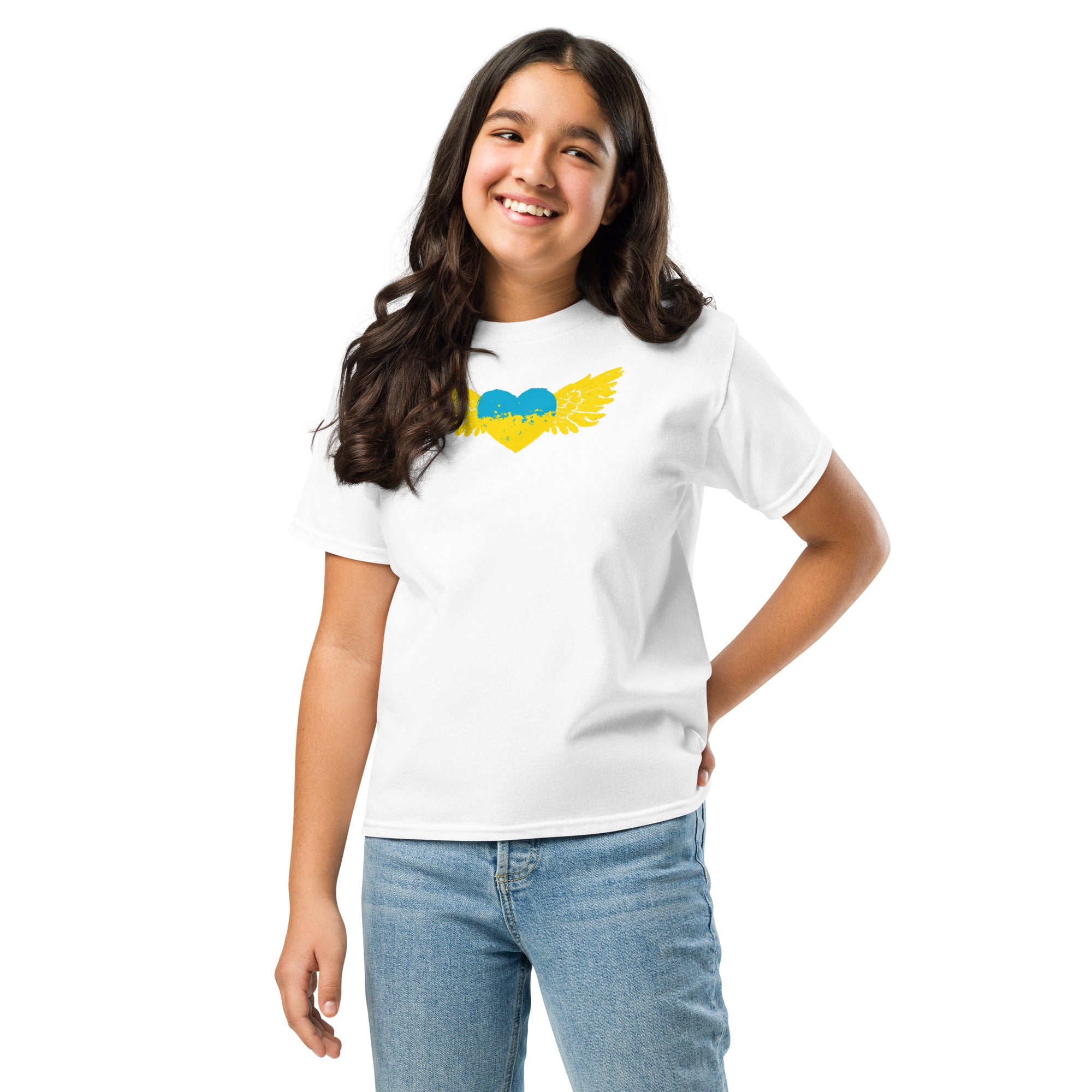 Youth wearing a white T-shirt with a yellow Ukrainian Tryzub emblem, showcasing heritage pride and comfort.