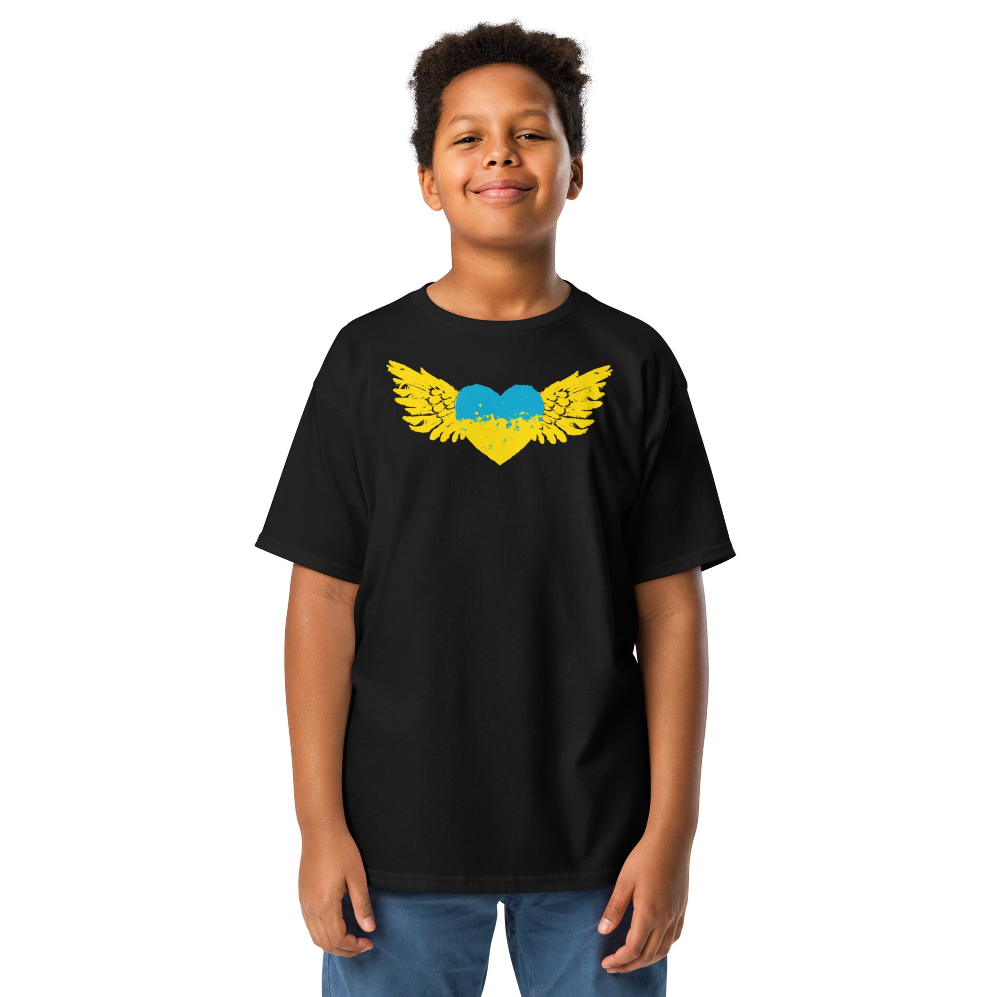 Youth wearing a classic black t-shirt with Ukrainian Tryzub emblem, showcasing Ukrainian pride and culture. Ideal for active lifestyles.