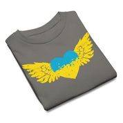 Folded grey t-shirt with a blue and yellow heart and wings design symbolizing Ukrainian pride.