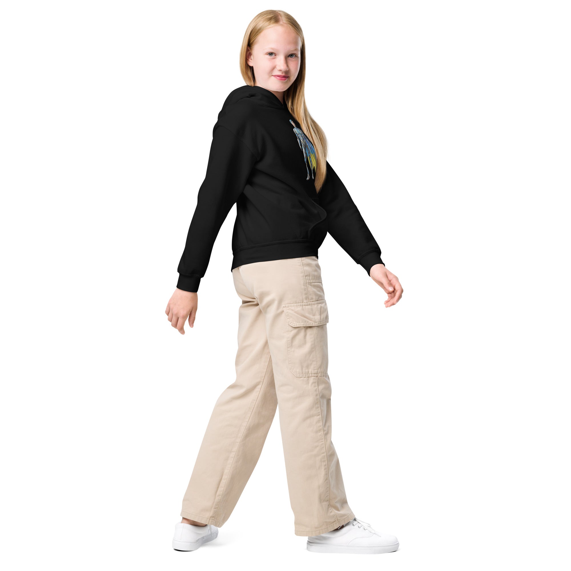 Youth wearing black hoodie with Ukrainian superhero design and beige pants, highlighting style and durability for active kids.