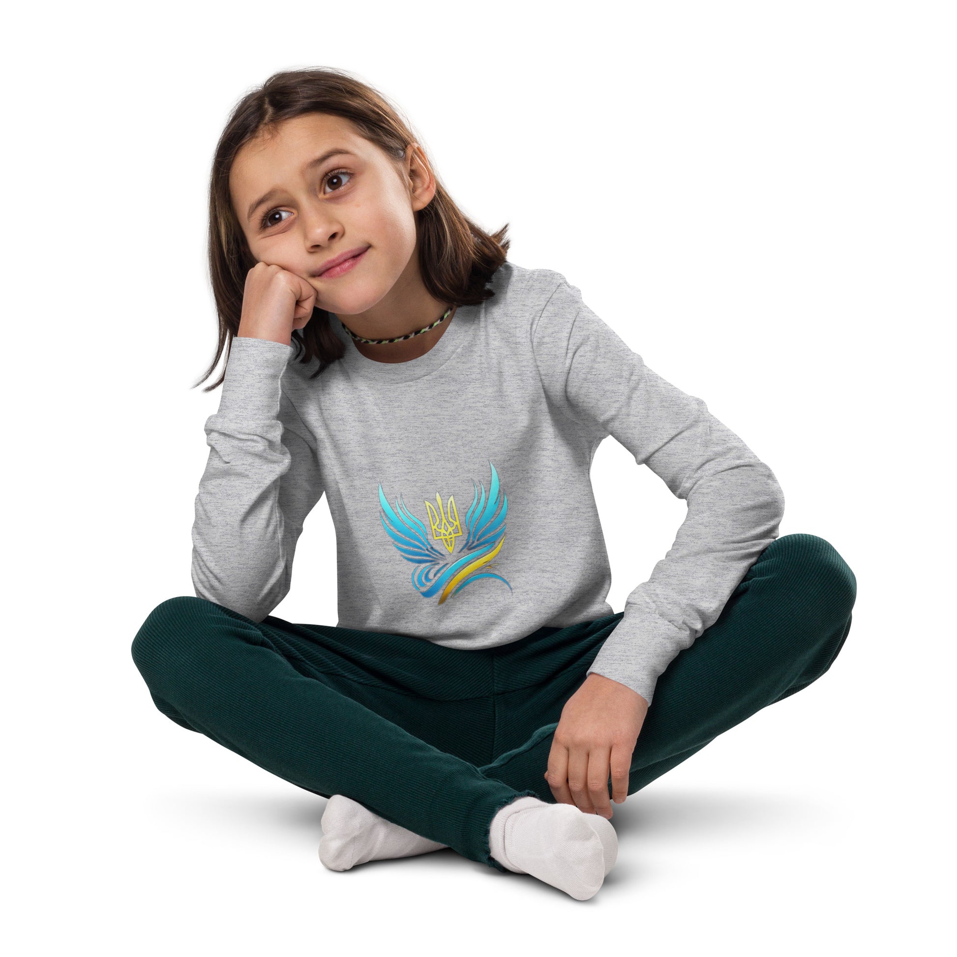 Youth wearing long sleeve tee with Ukrainian Tryzub logo, featuring a soft, comfortable fabric perfect for showcasing cultural pride.