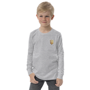 Boy wearing gray long sleeve shirt with golden Ukrainian Trizub on the heart, showcasing cultural pride and comfort.