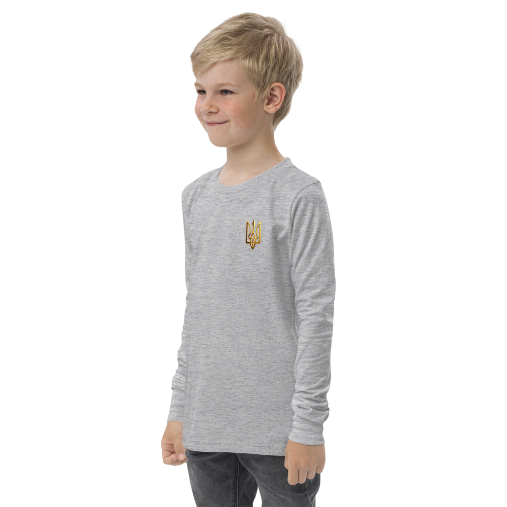 Boy wearing grey youth long sleeve shirt with golden Ukrainian Trizub, showcasing heritage, made from soft, durable cotton.