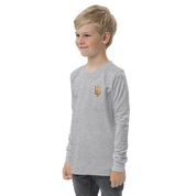 Boy wearing grey youth long sleeve shirt with golden Ukrainian Trizub, showcasing heritage, made from soft, durable cotton.