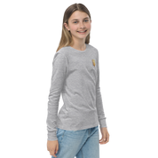 Youth wearing long sleeve shirt with golden Ukrainian Trizub on heart, in heather gray, showcasing pride and heritage.