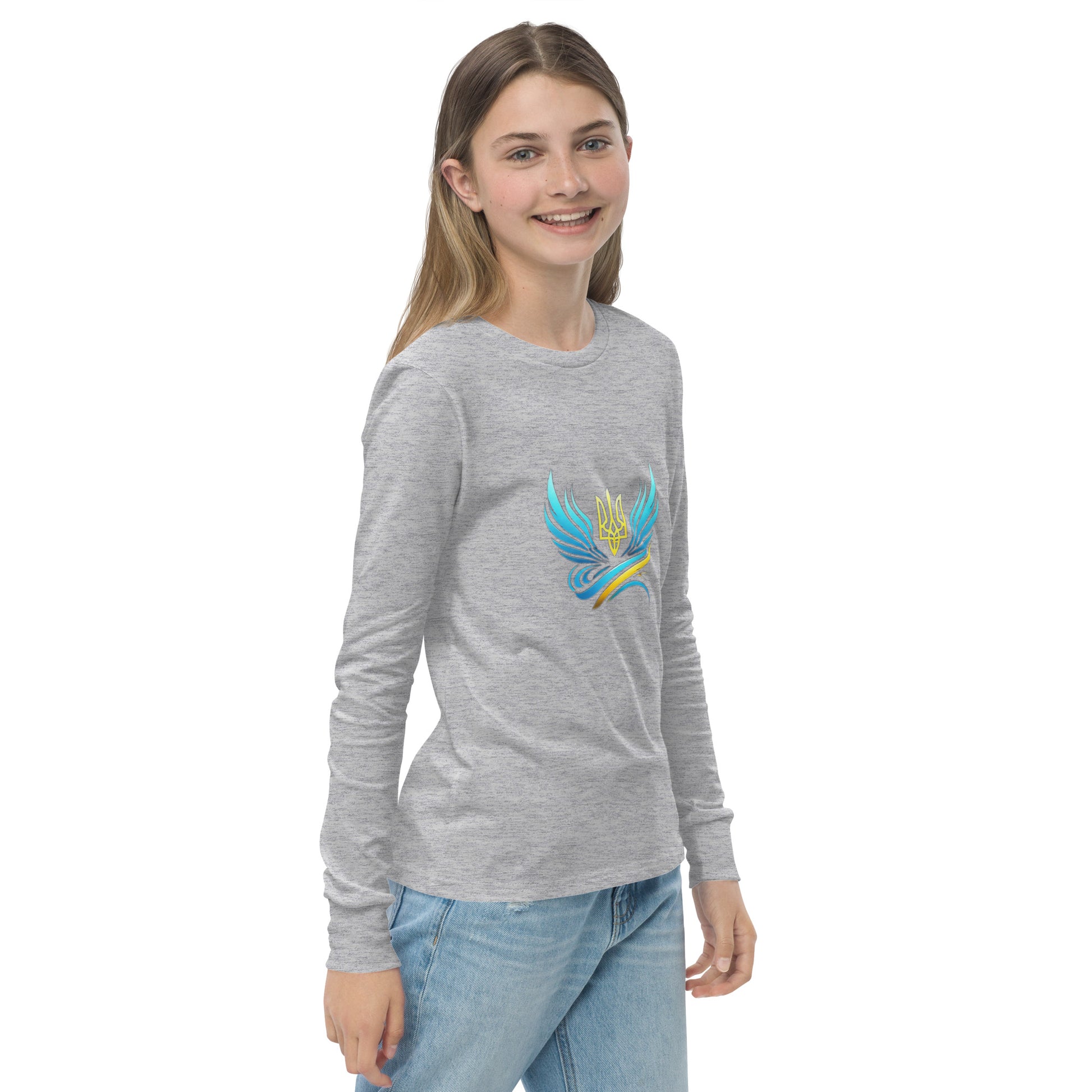 Youth long sleeve tee with Ukrainian Vibe Tryzub logo in gray, worn by smiling child, made from soft Airlume cotton.