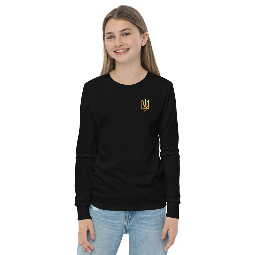 Young woman wearing black long sleeve shirt with golden Ukrainian Trizub on heart