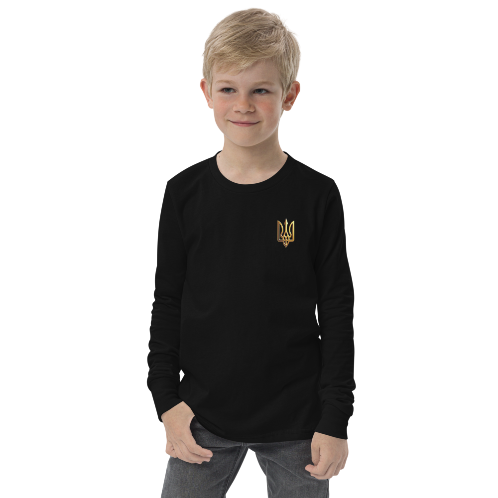 Youth wearing black long sleeve shirt with golden Ukrainian Trizub on heart, soft cotton material, showcasing cultural pride.