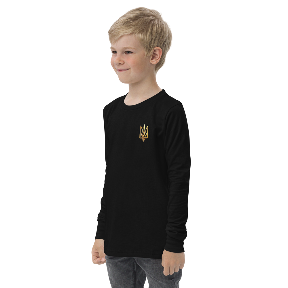 Youth wearing black long sleeve shirt with golden Ukrainian Trizub design on the heart, showcasing heritage and style.