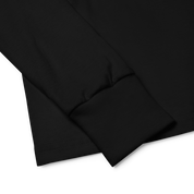 Close-up of black long sleeve cuff on youth shirt made from soft Airlume combed and ring-spun cotton.