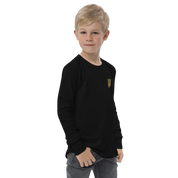 Youth wearing black long sleeve shirt with gold Ukrainian trizub on heart, soft Airlume cotton, showcasing Ukrainian pride.