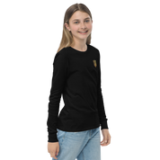 Youth wearing black long sleeve shirt with golden Ukrainian Trizub on chest, showcasing cultural pride and comfort.