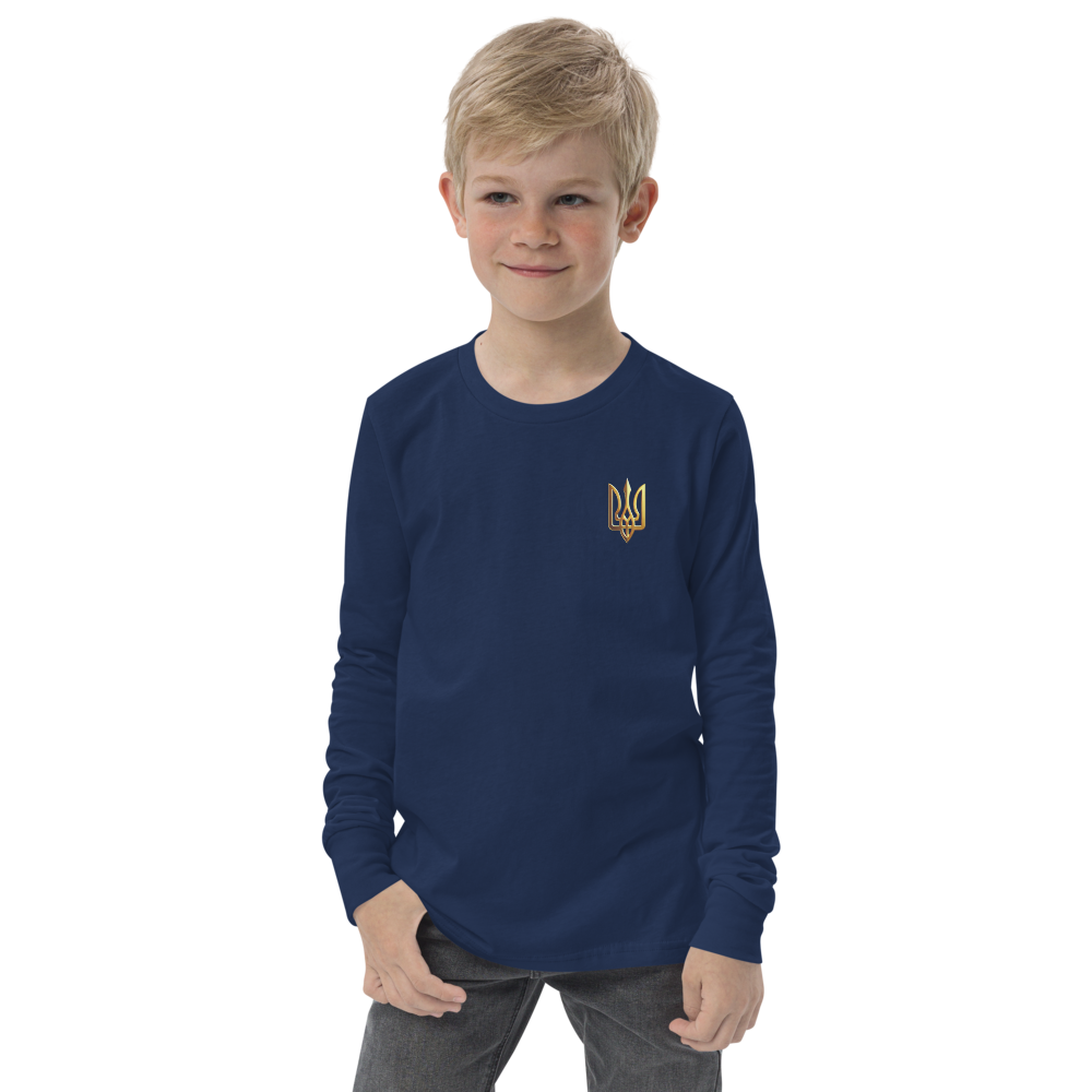 Youth wearing a navy long sleeve shirt with golden Ukrainian Trizub on the heart, showcasing national pride.