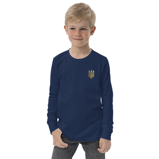 Youth wearing a navy long sleeve shirt with golden Ukrainian Trizub on the heart, showcasing national pride.