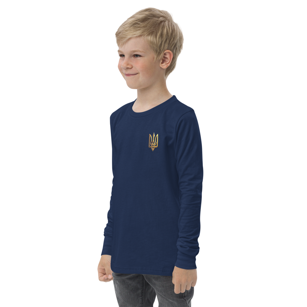 Young boy wearing youth long sleeve shirt with golden Ukrainian Trizub on heart, showcasing cultural pride and style.