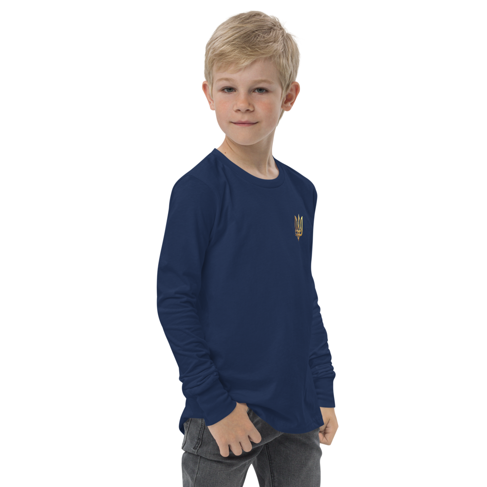 Youth wearing blue long sleeve shirt with golden Ukrainian Trizub design on chest, showcasing cultural pride and style.