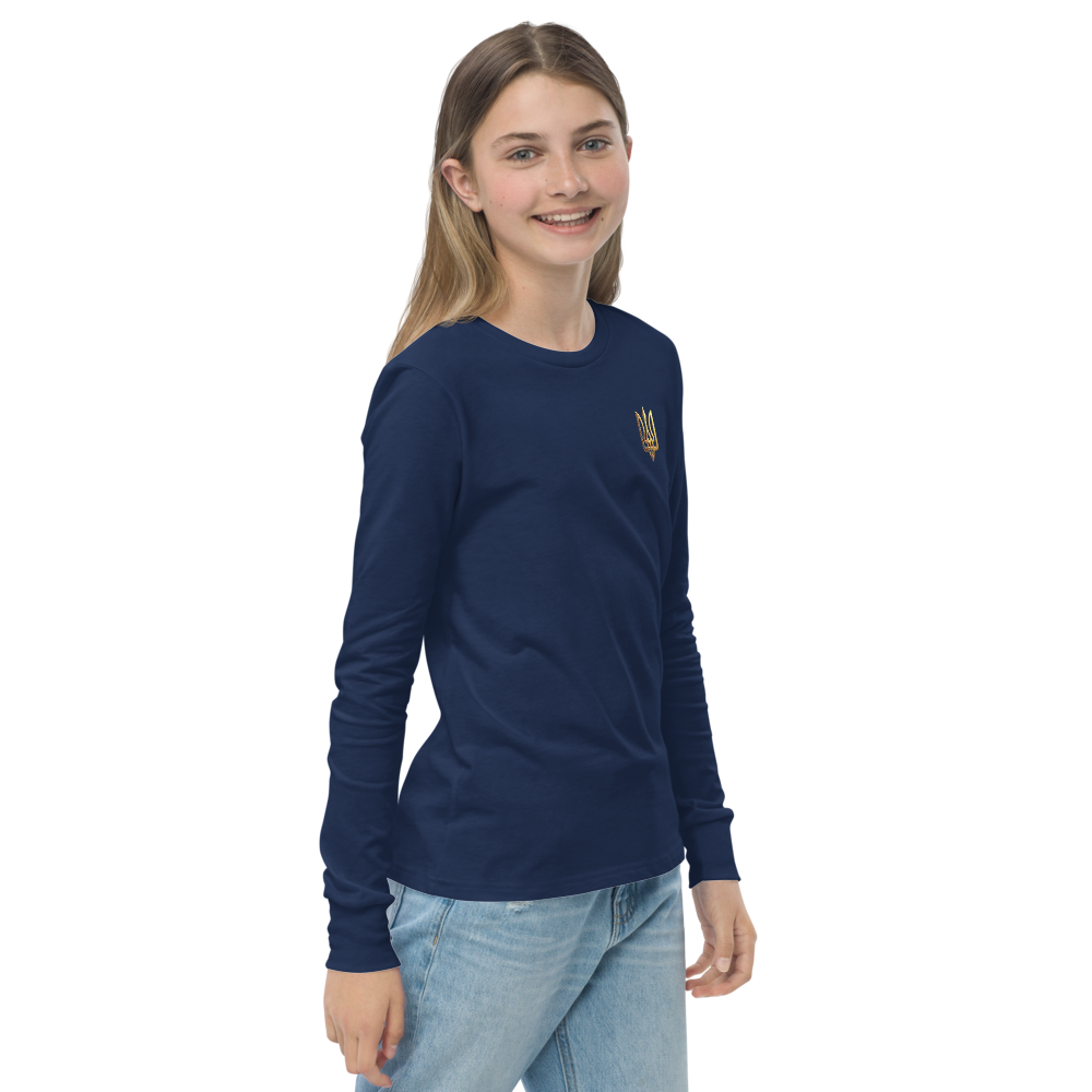 Youth wearing long sleeve navy shirt with golden Ukrainian Trizub on heart, soft cotton, ribbed cuffs, showcases Ukrainian pride.