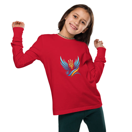 Smiling child wearing red long sleeve tee with Ukrainian Vibe Tryzub logo, showcasing heritage and comfort in Airlume cotton.