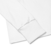 Close-up of white long sleeve shirt cuff highlighting soft ribbed fabric.