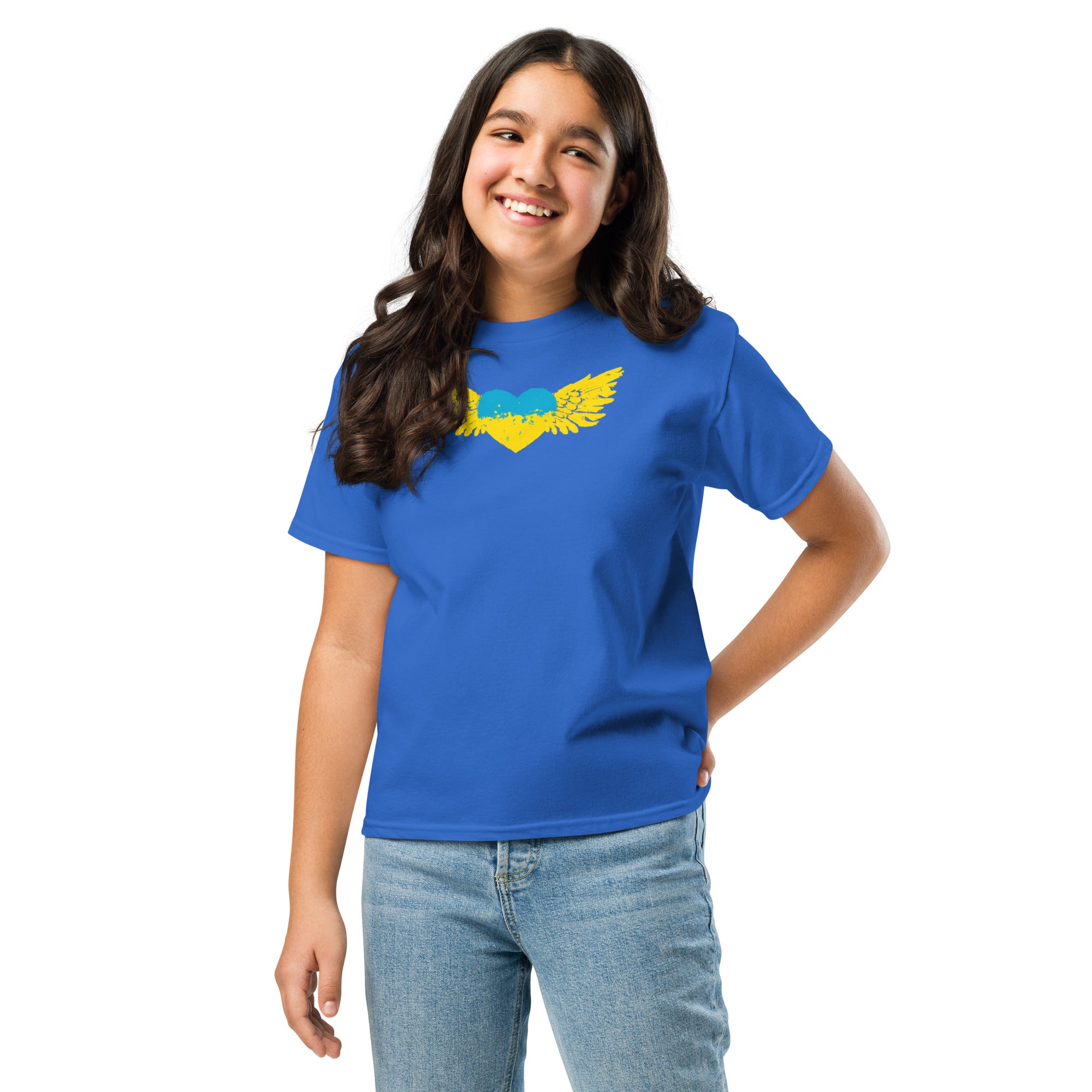 Youth wearing a blue t-shirt with yellow Ukrainian Tryzub emblem, celebrating Ukrainian pride and culture.