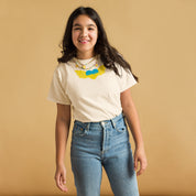 Youth girl wearing a classic t-shirt with Ukrainian Tryzub emblem, showcasing cultural pride and comfort.