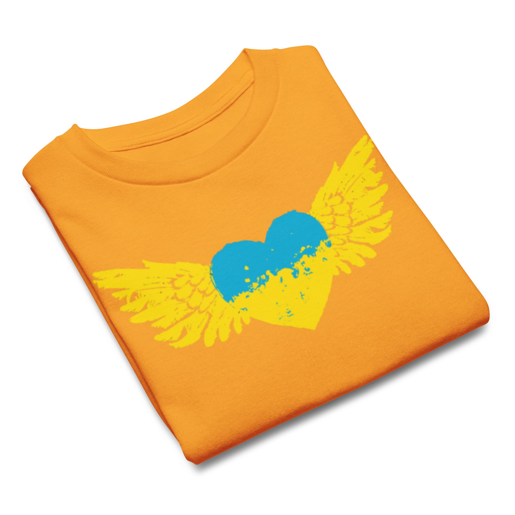 Orange t-shirt with a blue and yellow heart and wings design symbolizing Ukrainian spirit.